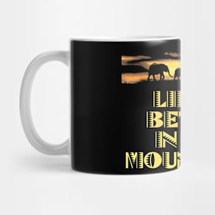 LIFE IS BETTER IN THE MOUNTAINS African Safari Themed Elephants Walking On The Savanne With A Bright Yellow Sunset Mug